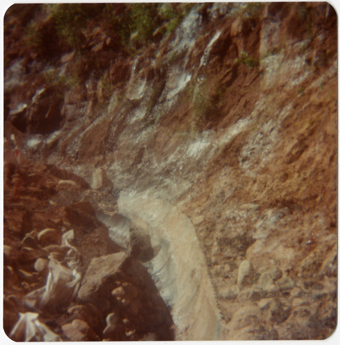 Rocky side of mountain with trench during road repair of Kolob Canyon Road.