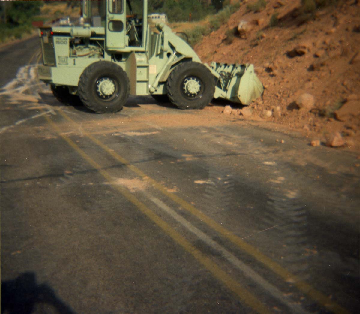Color Photo of a rock slide near the junction of routes 1 and 2.