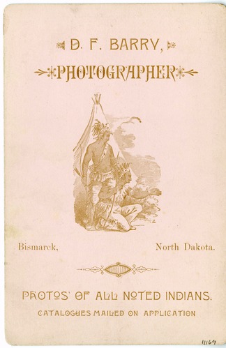 Sitting Bull in Long Feathered Headdress and Holding a Club