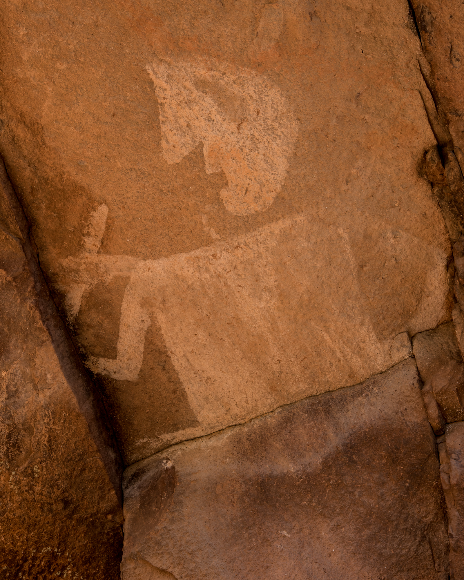 A pictograph of a man with a big nose. 