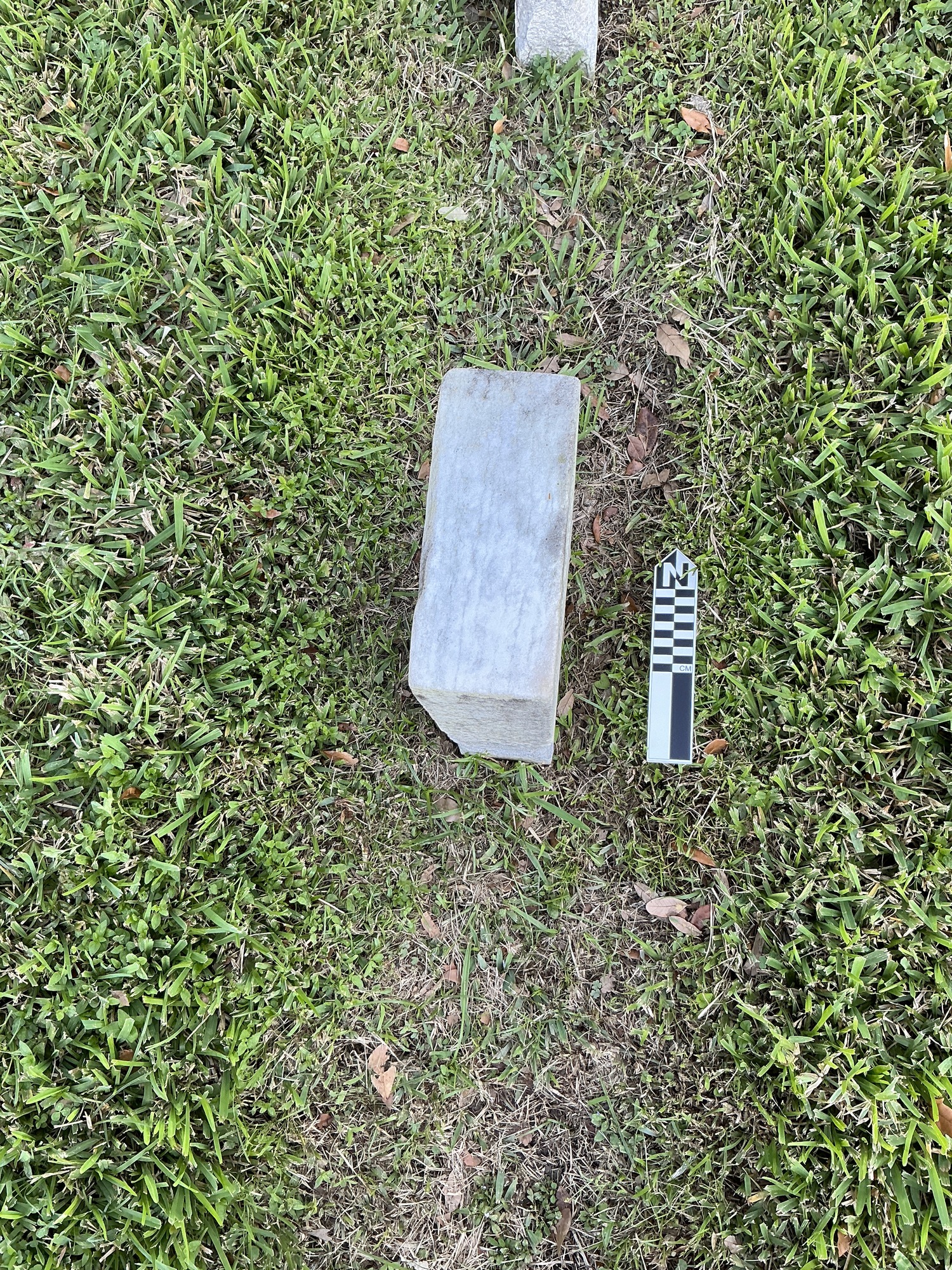 Extra image of historic upright marble headstone with recessed shield face.