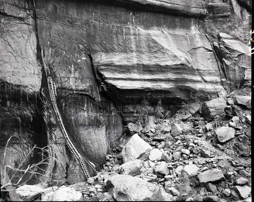 Construction of ladder to spring on wall, water supply for the comfort station at the Temple of Sinawava.