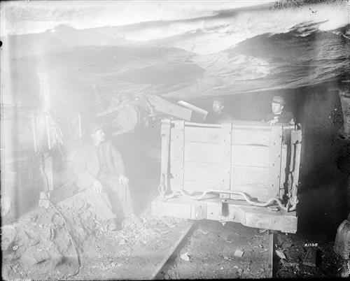 A1137-A1138--Unknown location--Mine scene--Conveyor Type Equipment for Loading Mined Coal into Mine Cars [1915]