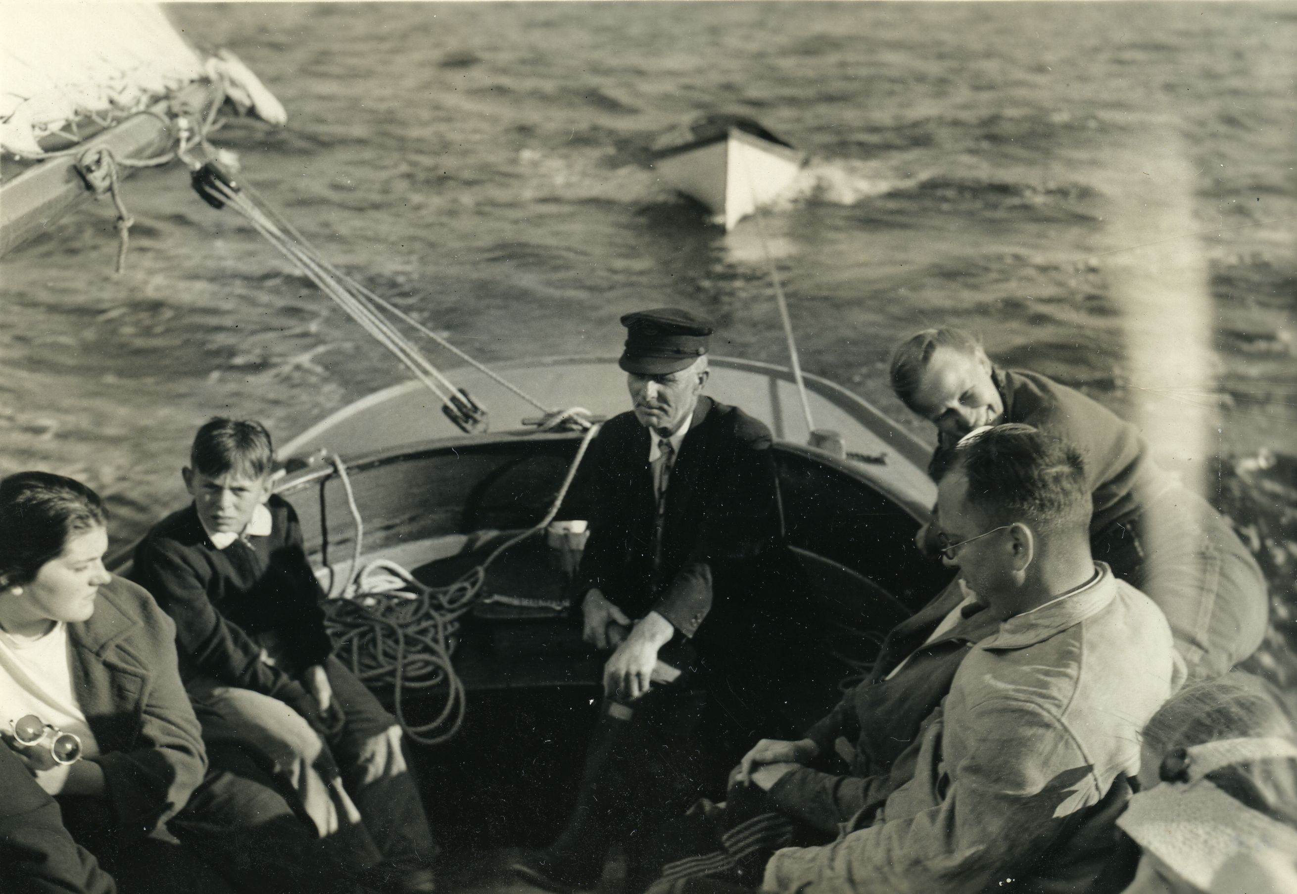 CAPT. PINKHAM STEERING BOAT