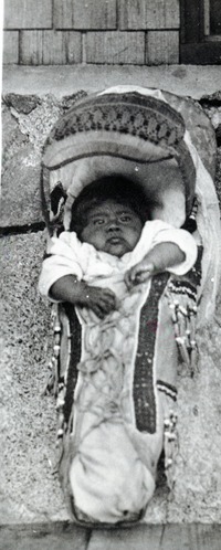 Copy Neg: July, 1981 by Michael Dixon. Unidentified child in Paiute cradle - probably Yosemite Valley. From S. Sargent collection.