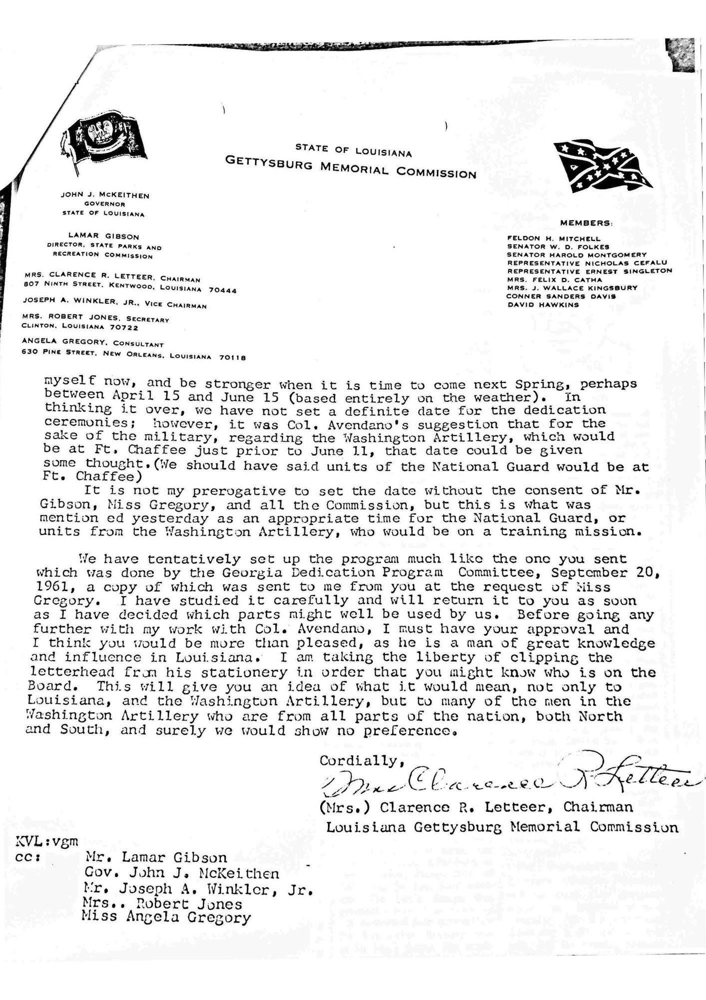 White paper with typed black text and a handwritten signature