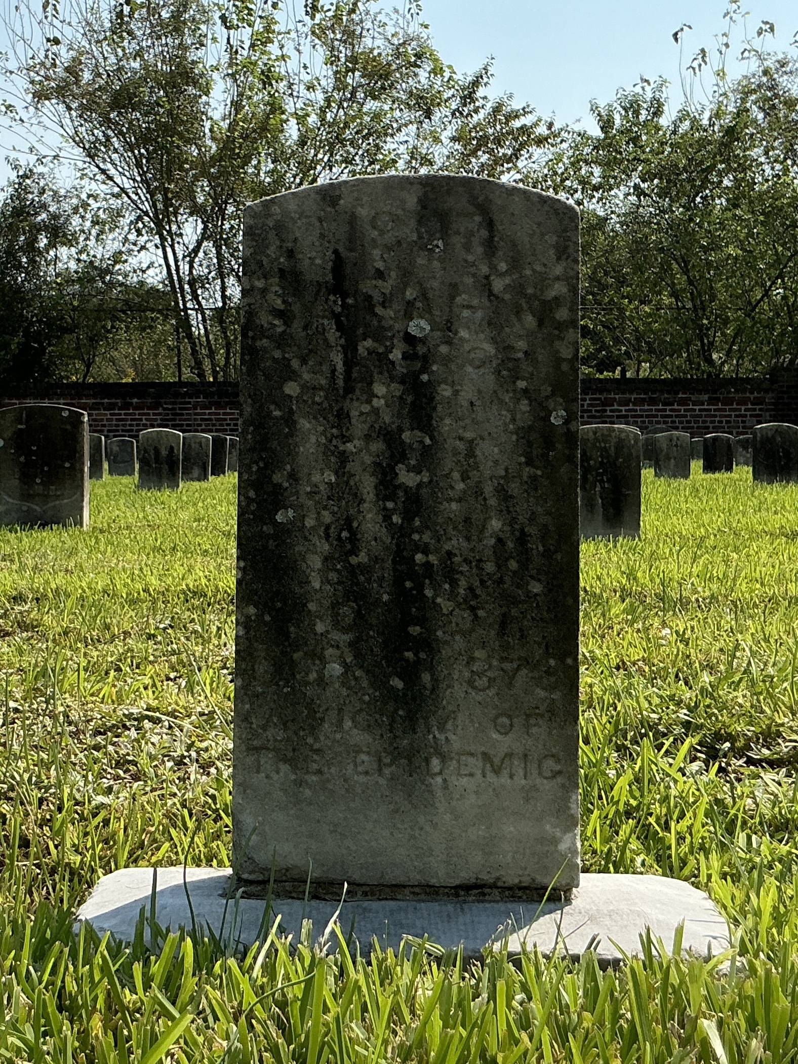 Front of headstone with flat face.