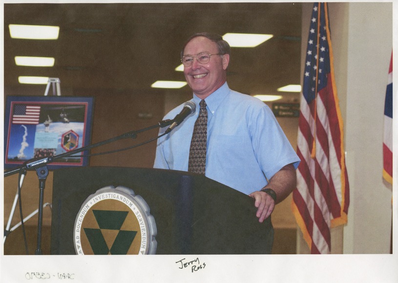 A man speaking at a podium