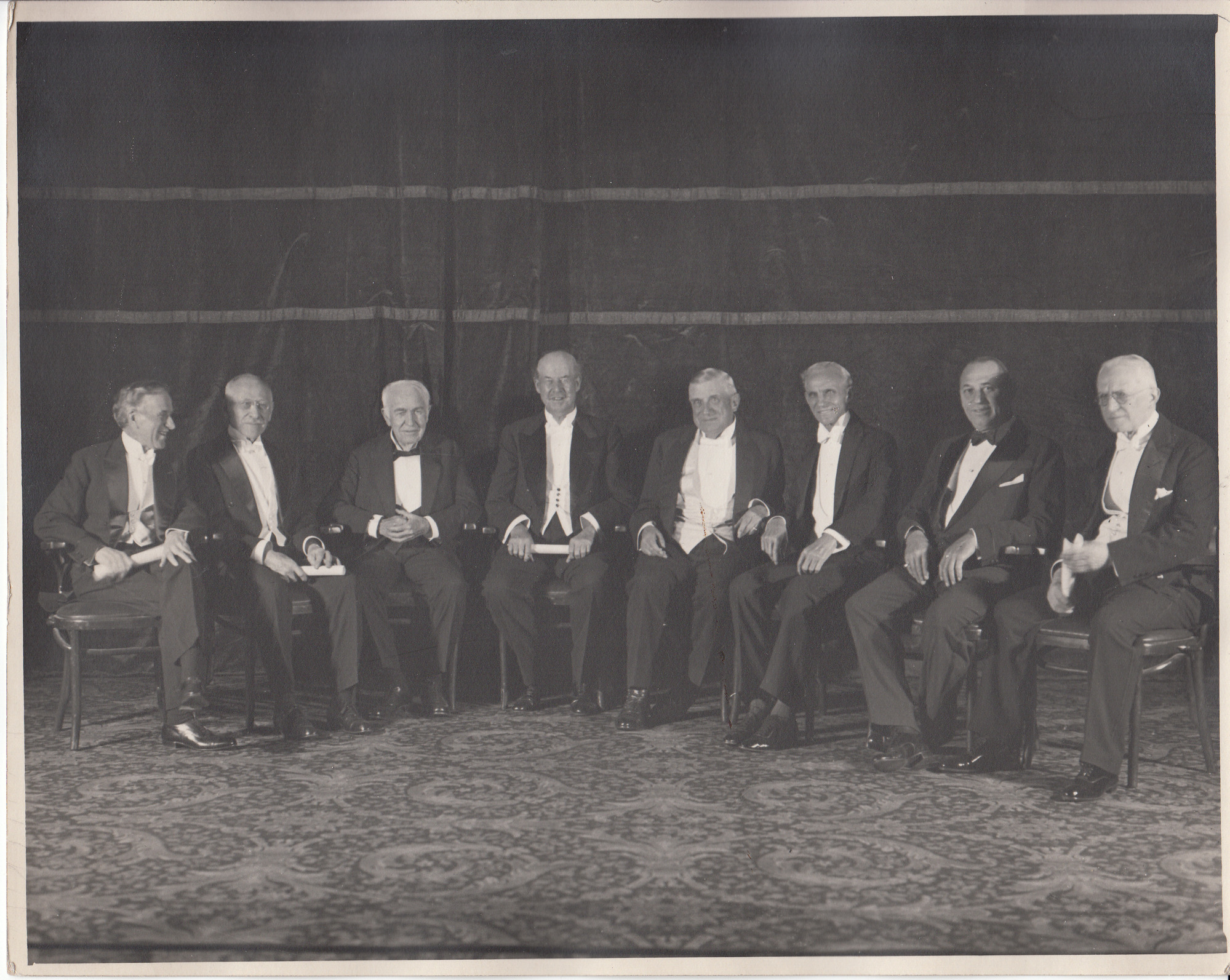 Left to right, Harvey Firestone, Julius Rosenwald, Thomas Edison, Thomas Lipton, Charles M. Schwab, Henry Ford, Walter P. Chrysler, and George Eastman.