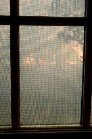 Burning and smoke in and around structures during the Long Mesa Fire, Mesa Verde National Park, July-August 2002