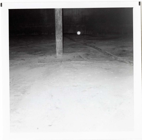 The interior of the 40000 gallon water tank showing buildup/corrosion.