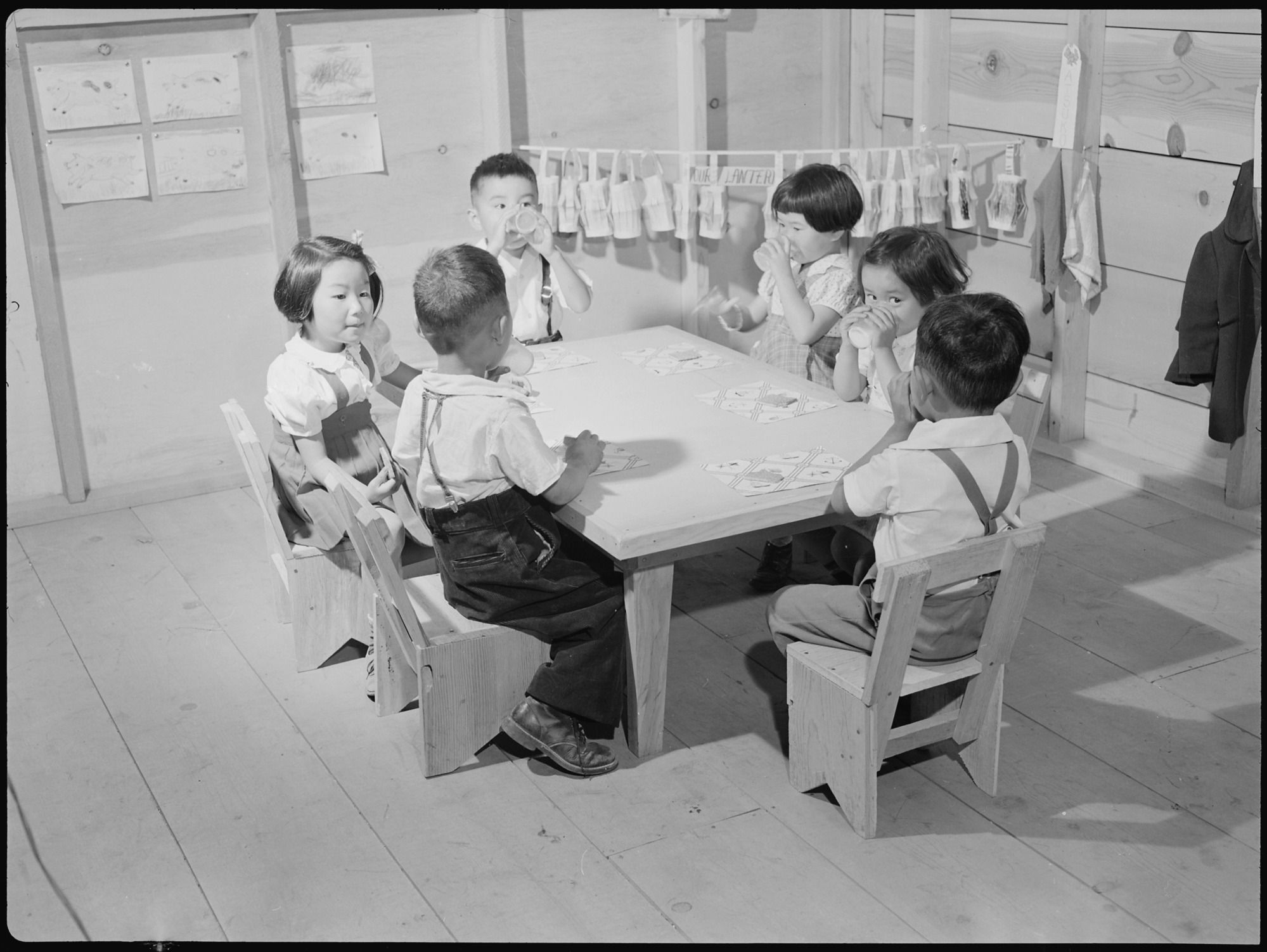 Milk and cracker time in the nursery school