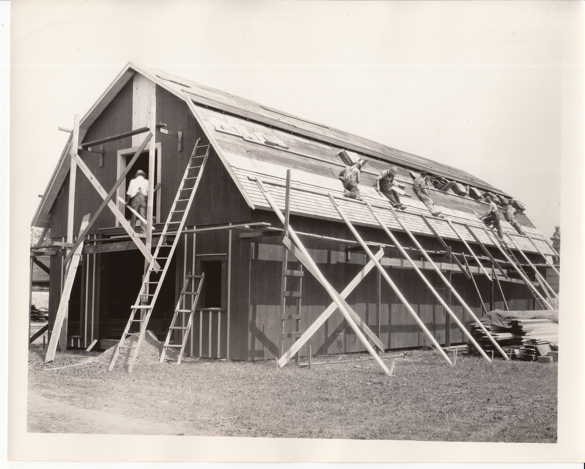 Site of Henry Ford Museum, Dearborn, Michigan, barn under construction.