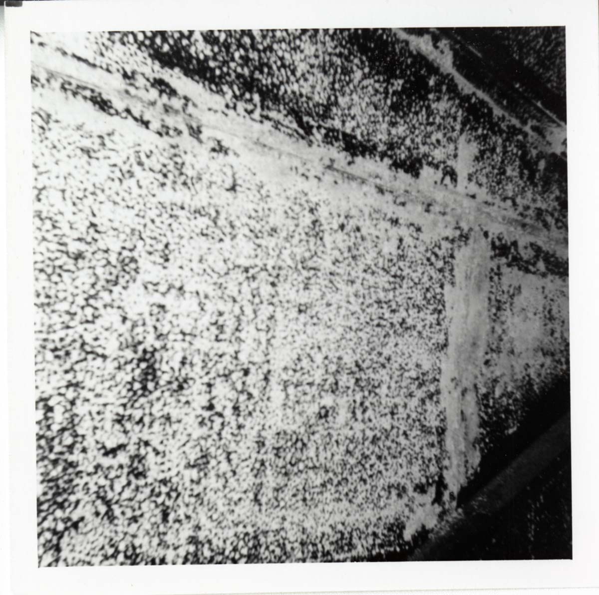 The interior of the 40000 gallon water tank showing buildup/corrosion.