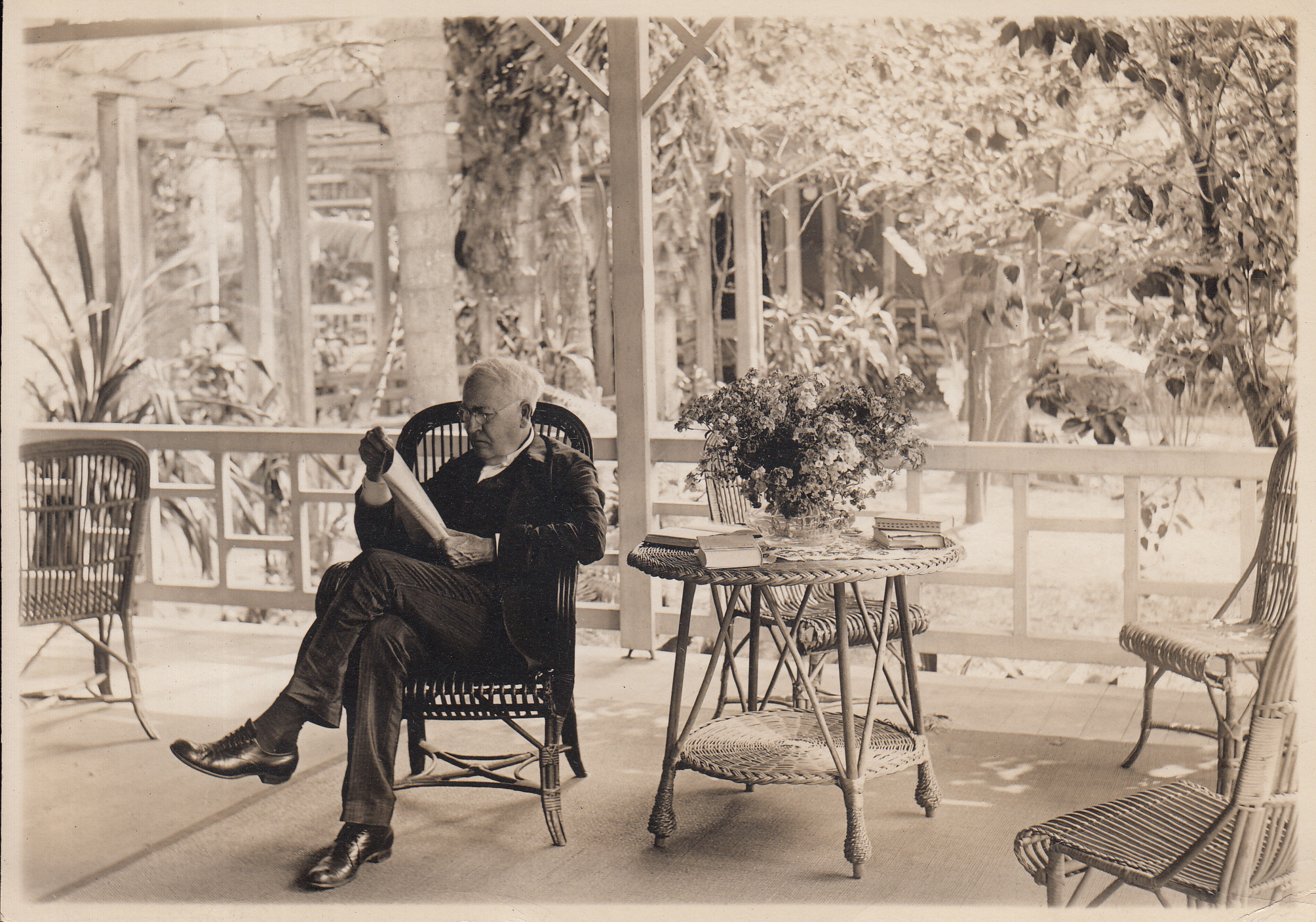 Thomas Edison sitting on the porch of his Florida house.