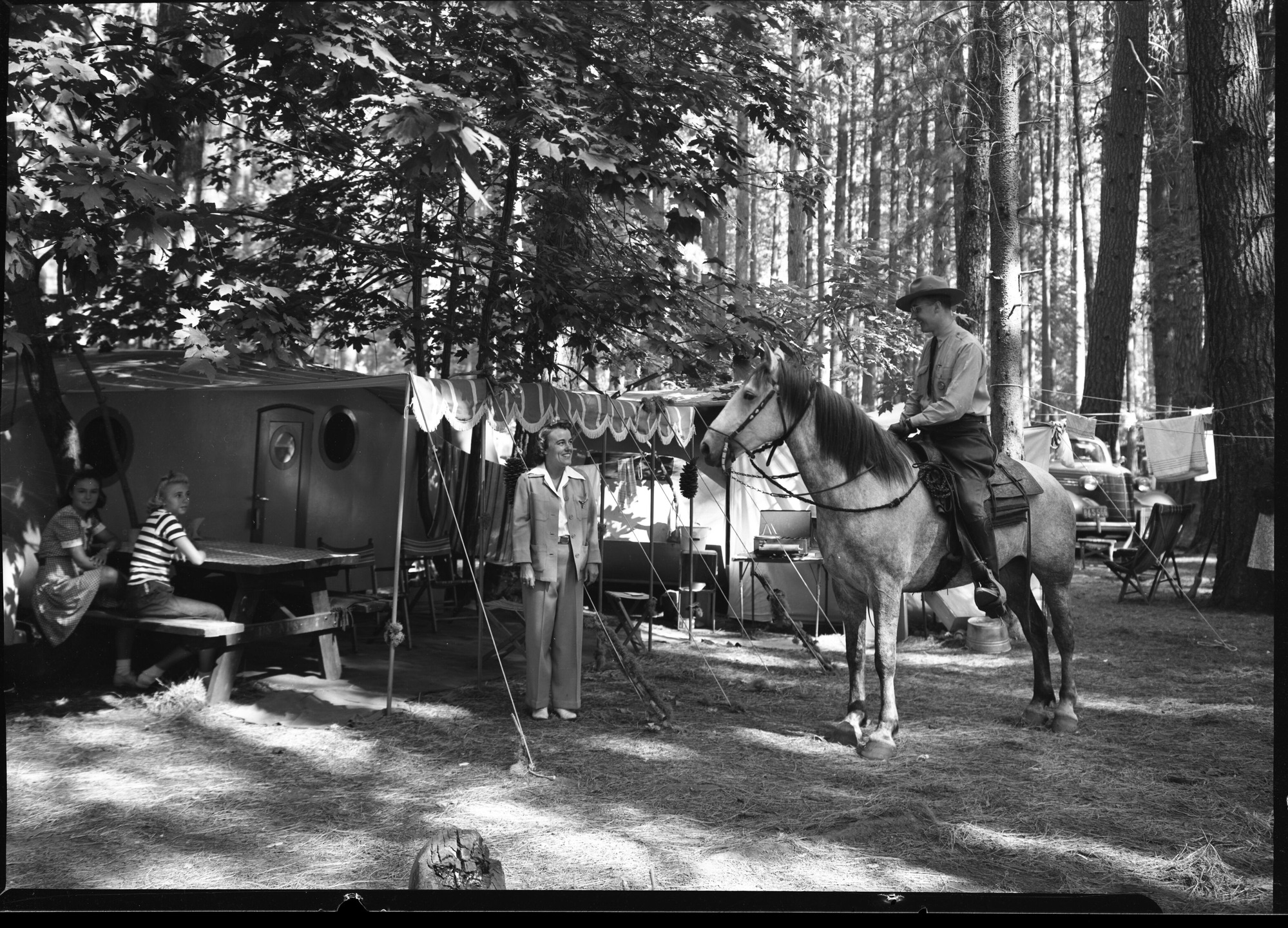 Ranger Harry during on horseback in campground.