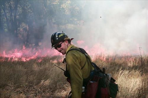 Crews using drip torches to ignite El Capitan prescribed burn, 2000, Yosemite National Park
