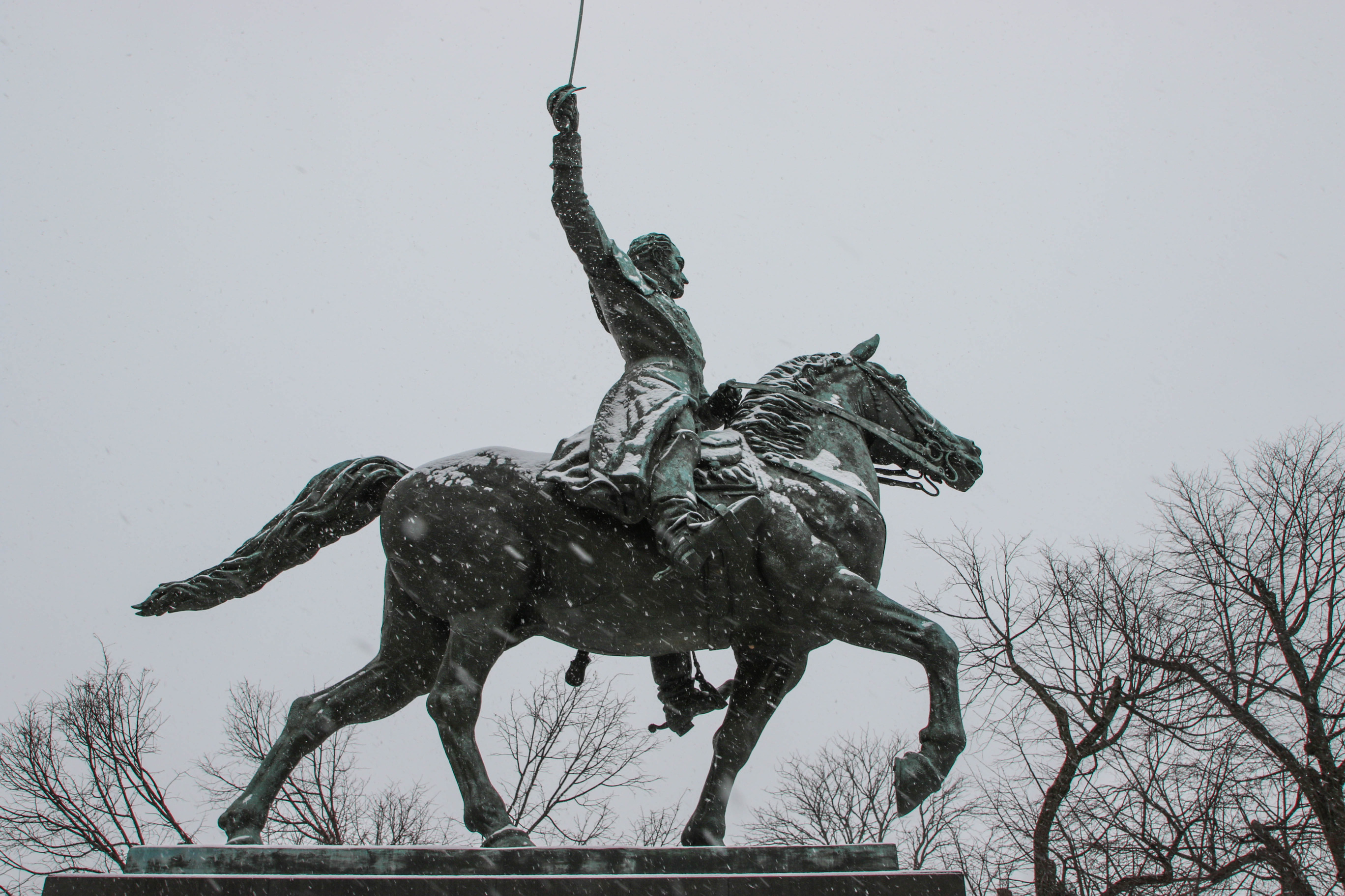 Bolivar statue during a snowfall