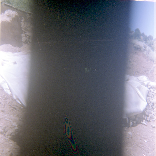 Rock pile covered with tarp during road work/repair in Kolob Canyon.
