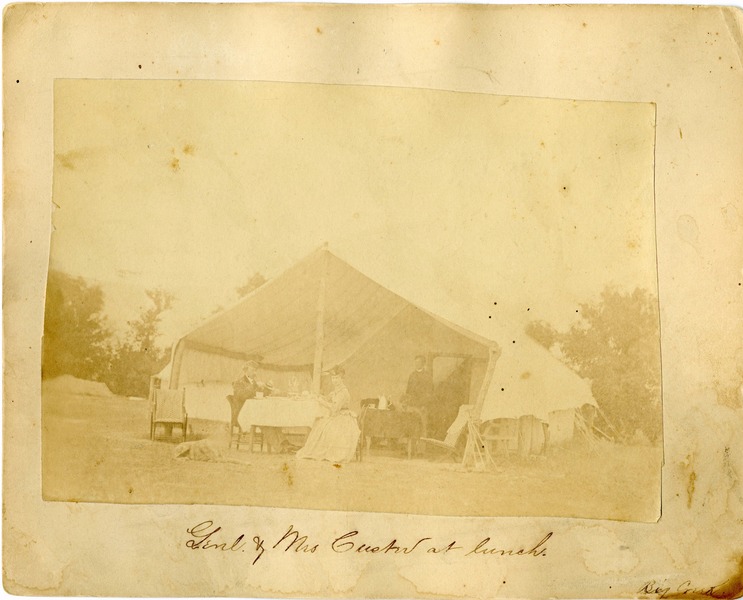 Elizabeth Bacon Custer and George Armstrong Custer Eating in Front of a Tent