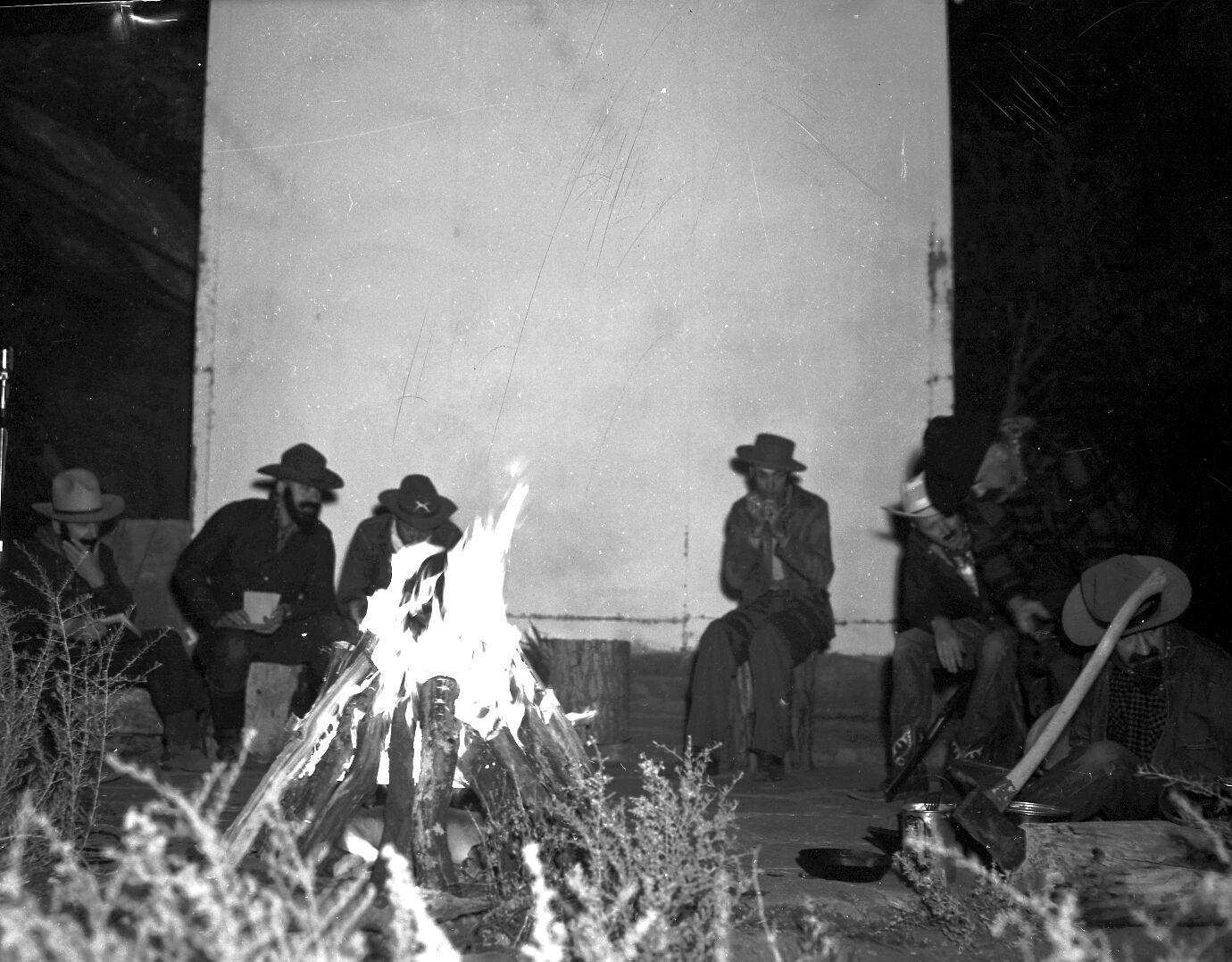 Staff in pioneer costumes performing during campfire program. Campfire Day, September 19, 1957 at the South Campground amphitheater.