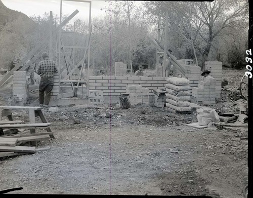 Comfort station construction, South Campground, bricklayers at work.