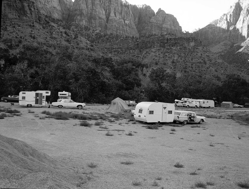 Camper use of overflow area, South Campground overcrowding group area.