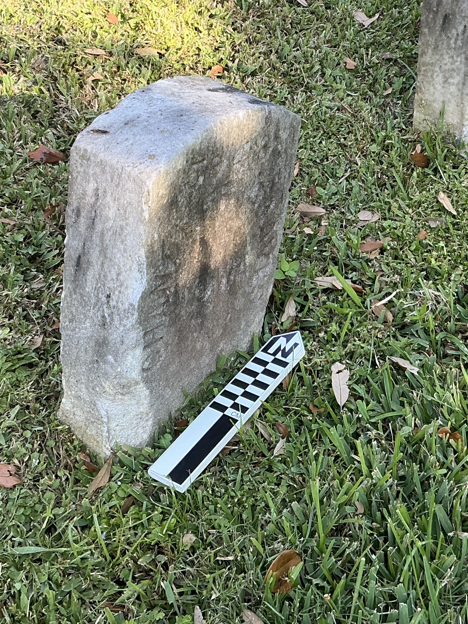 Extra image of historic upright marble headstone with flat face.