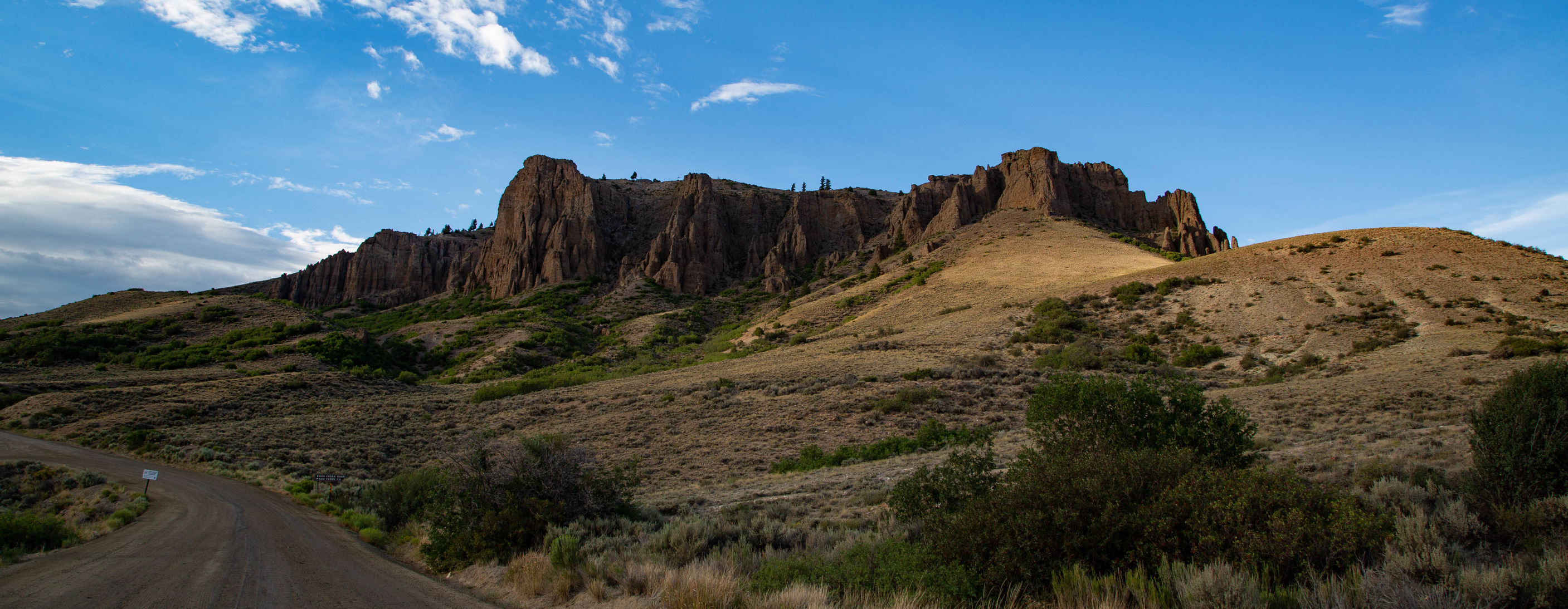 Cliffs next to a dirt road