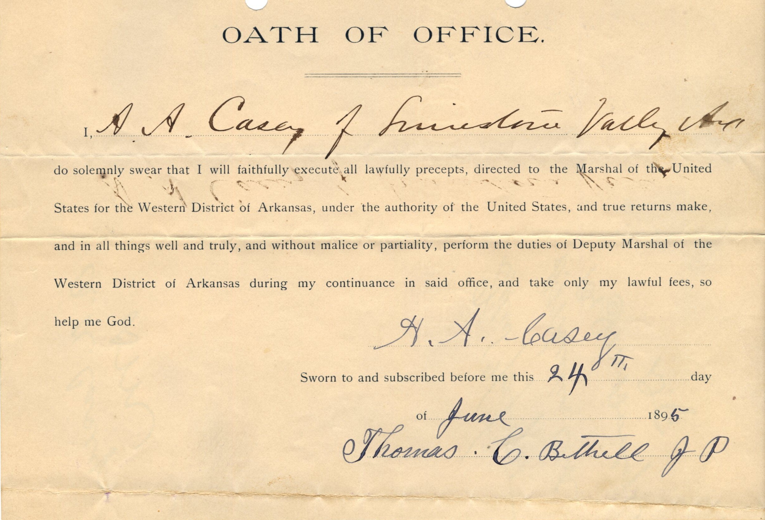 An aged slip of paper titled, "Oath of Office," with the signature of A. A. Casey dated June 24, 1895. Text reads: “I do solemnly swear that I will faithfully execute all lawful precepts, directed to the Marshal of the United States for the Western District of Arkansas, under the authority of the United States, and true returns make and in all things well and truly, and without malice or partiality, perform the duties of Deputy Marshal of the Western District of Arkansas during my continuance in said office, and take only my lawful fees, so help me god.”