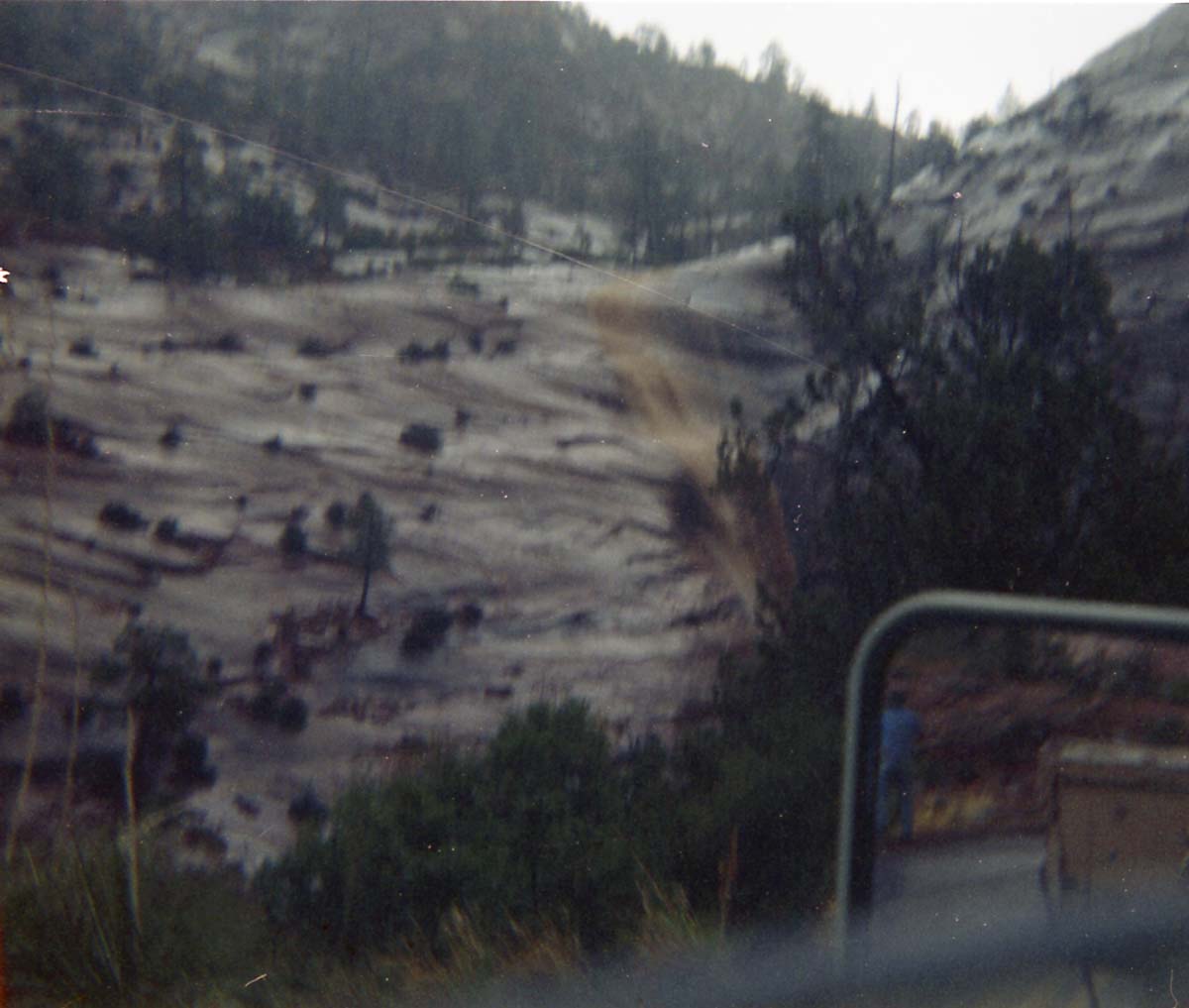Color photos of flood damage from the flood of 1975.