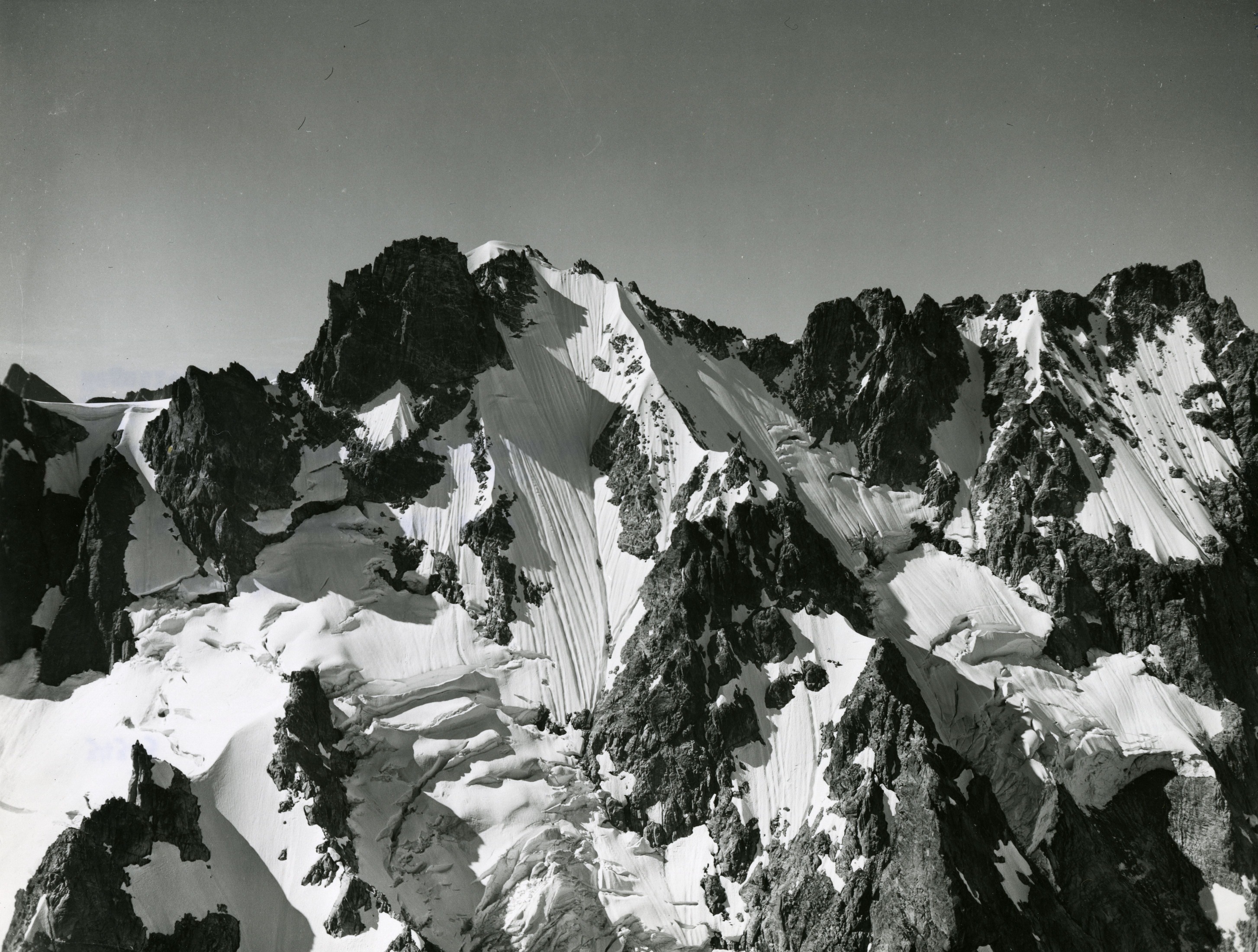 A mountain peak covered with glacier and snow.