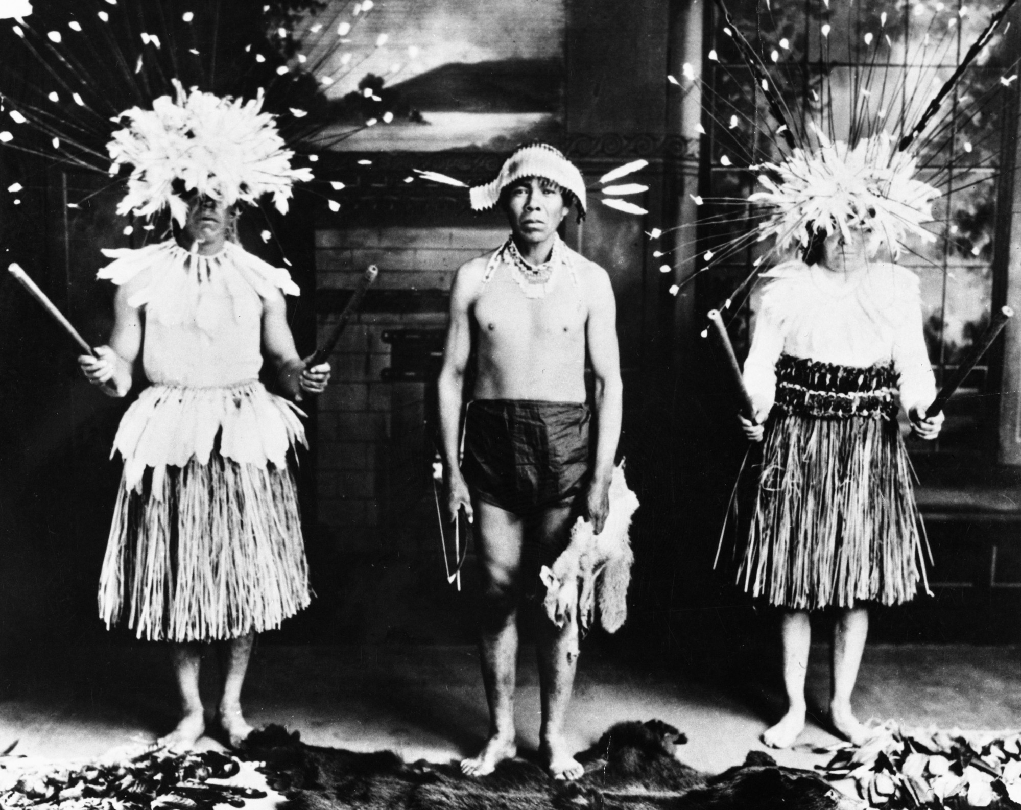 Maidu dancers at the Majestic Theater, Chico, CA. L-R: Herb Young, Gor. Nye, Dewey Conway. Taken as a promotional photo for traveling dance performances.