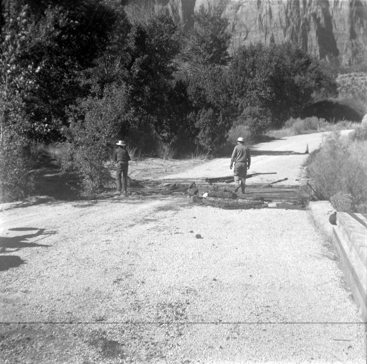 Men working to construct section of road along the scenic canyon drive near the Grotto.
