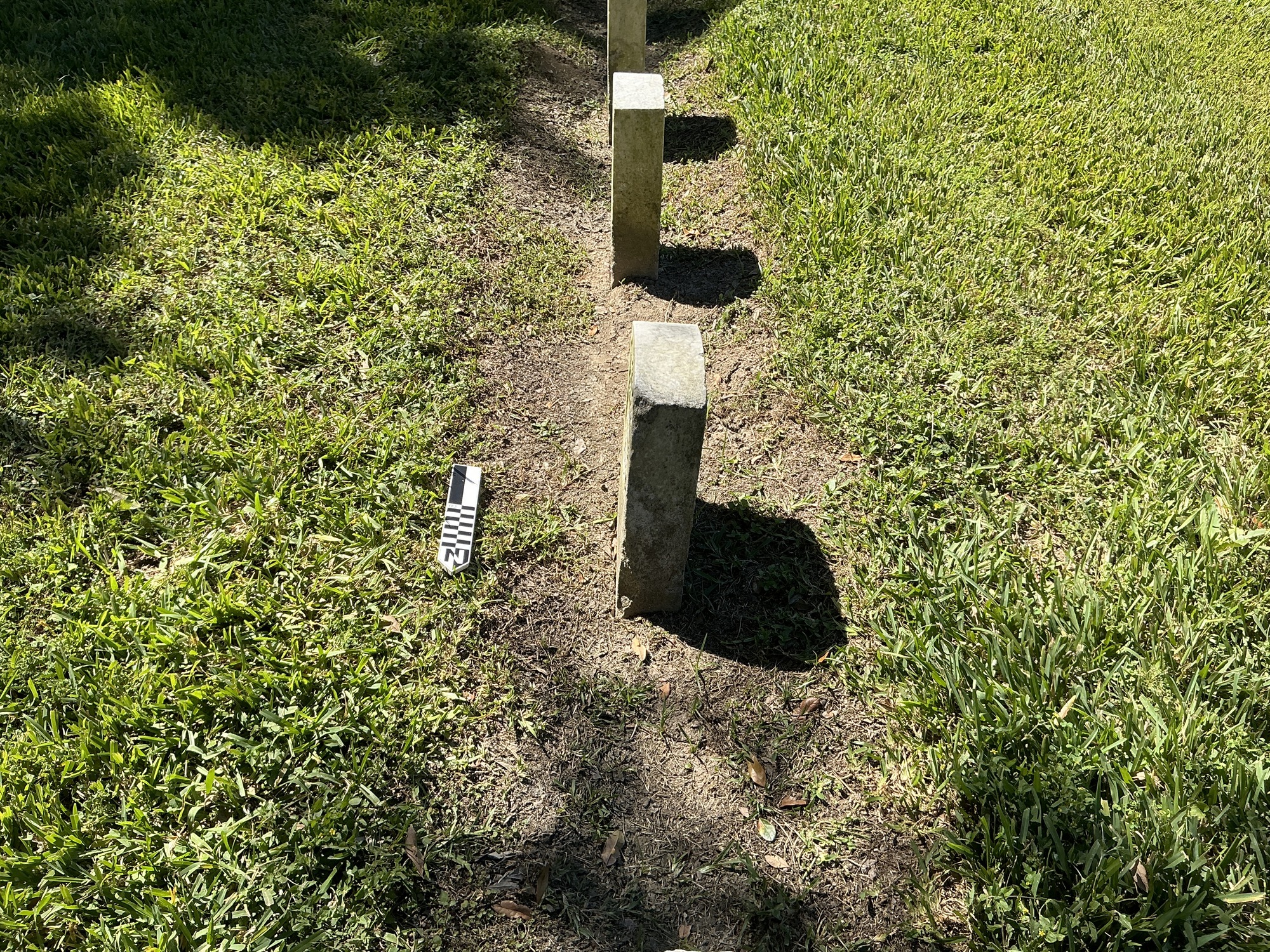 Extra image of historic upright marble headstone with recessed shield face.