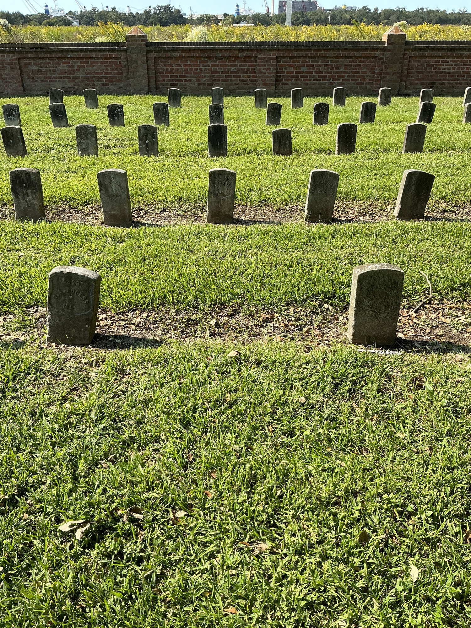 Extra image of historic upright marble headstone with recessed shield face.