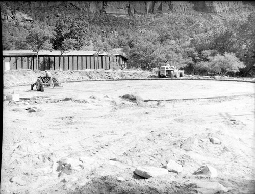 Leveling of fill or base for the laying of the metal floor during the construction of million gallon water tank at Birch Creek.