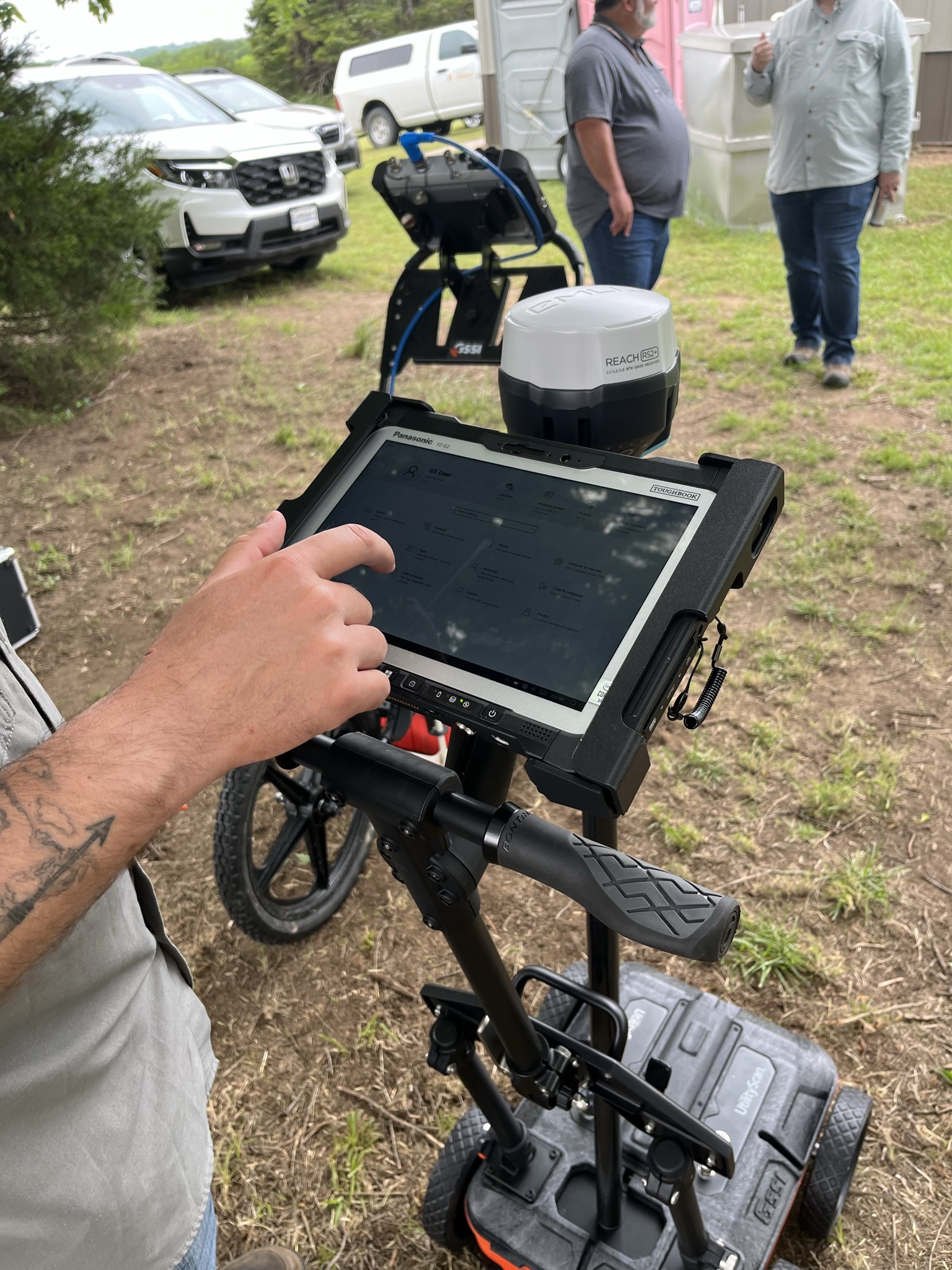 people learning and practicing with equipment in the field.