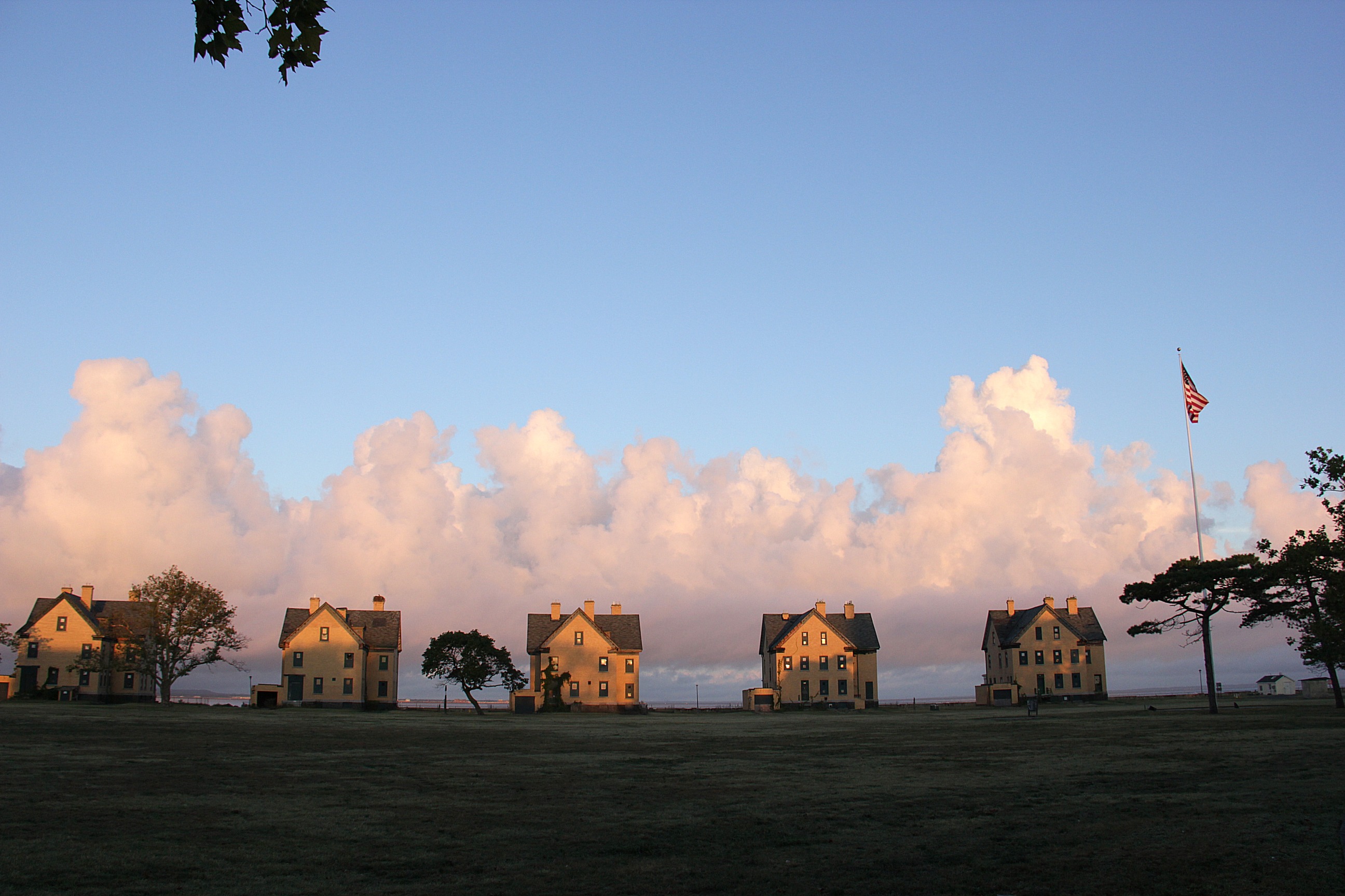 Row of historic buildings against blue sky