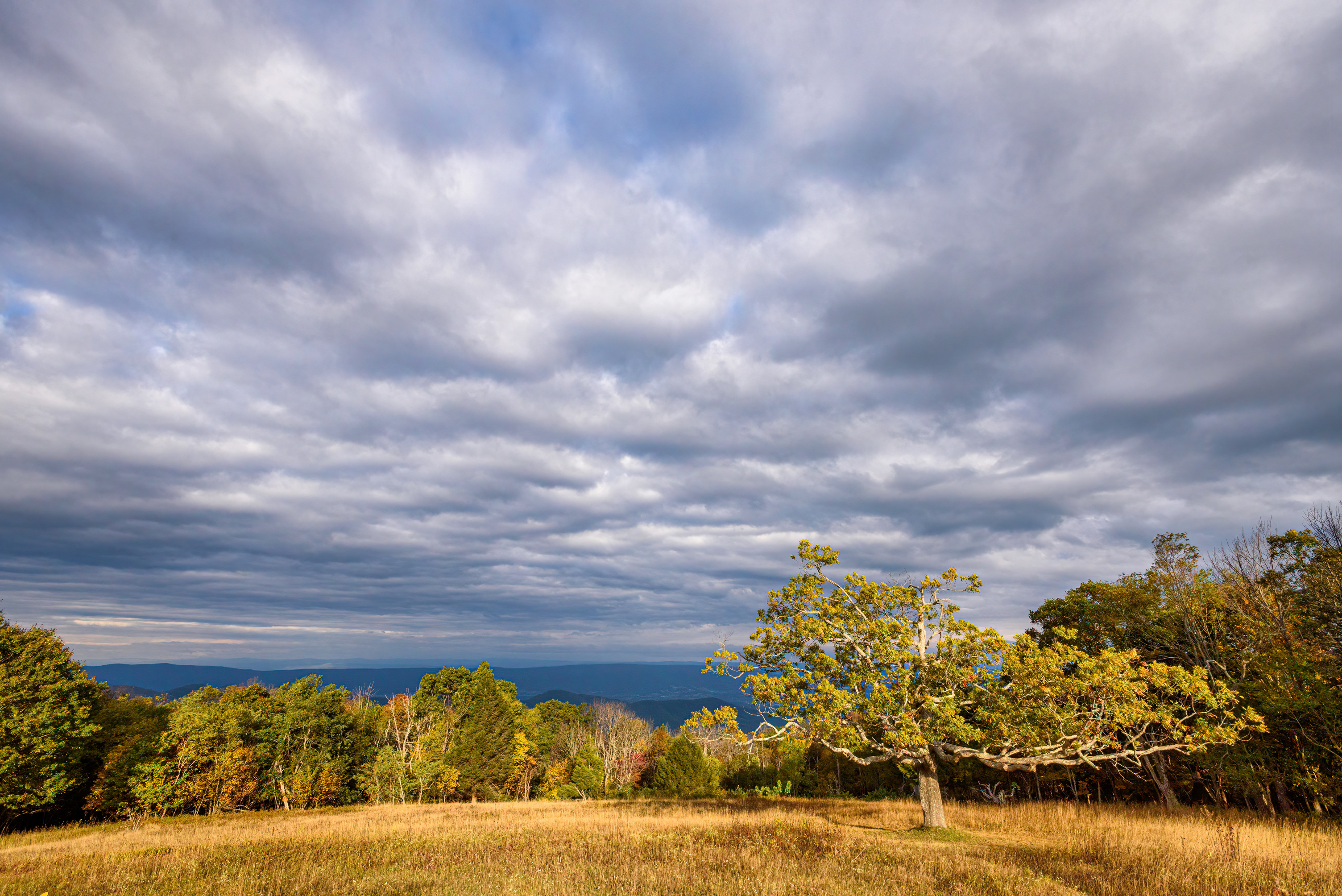 Dramatic clouds covering Tanners Ridge in early fall.