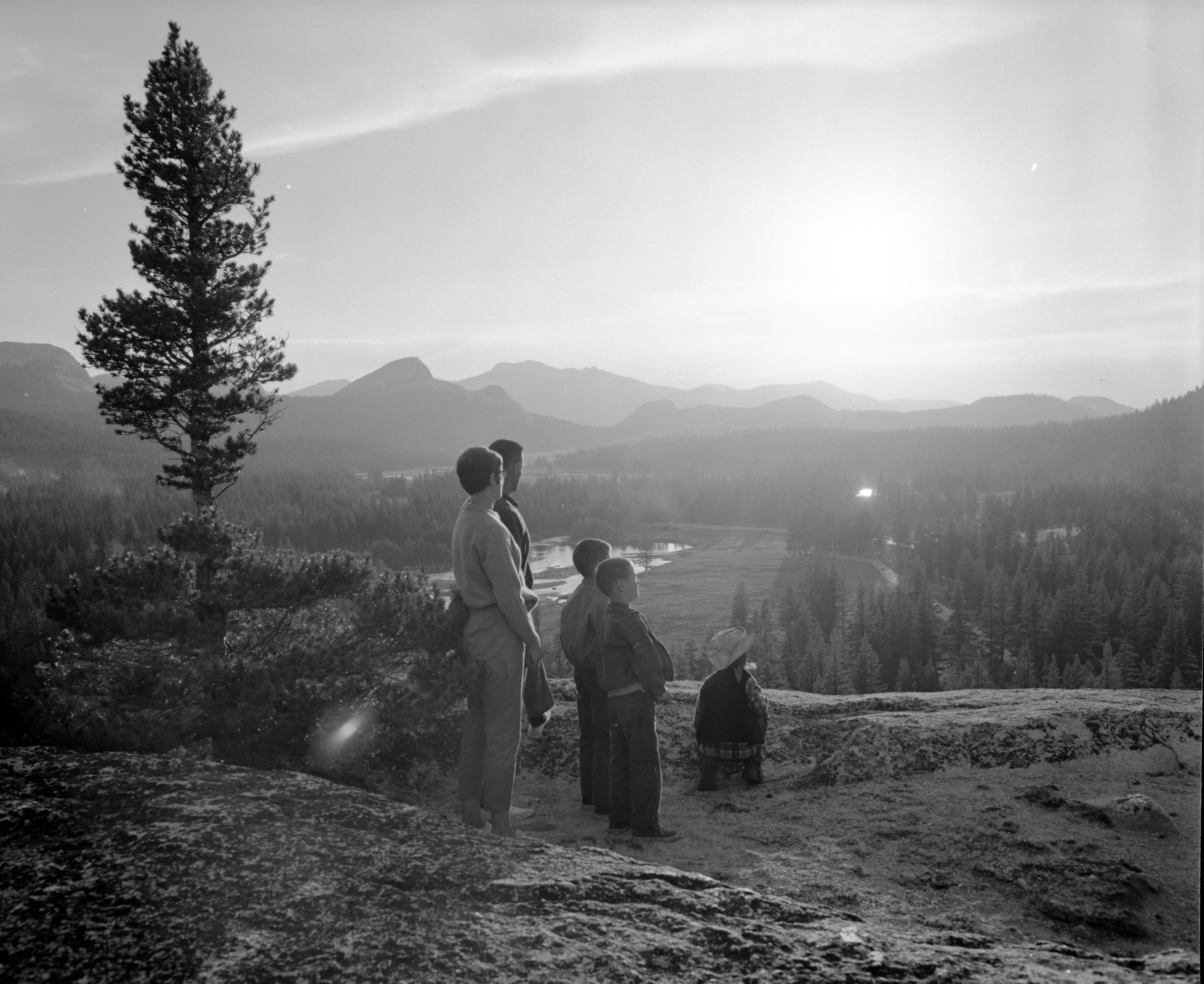 Visitors watching sunset at Tuolumne Meadows from Puppy Dome.