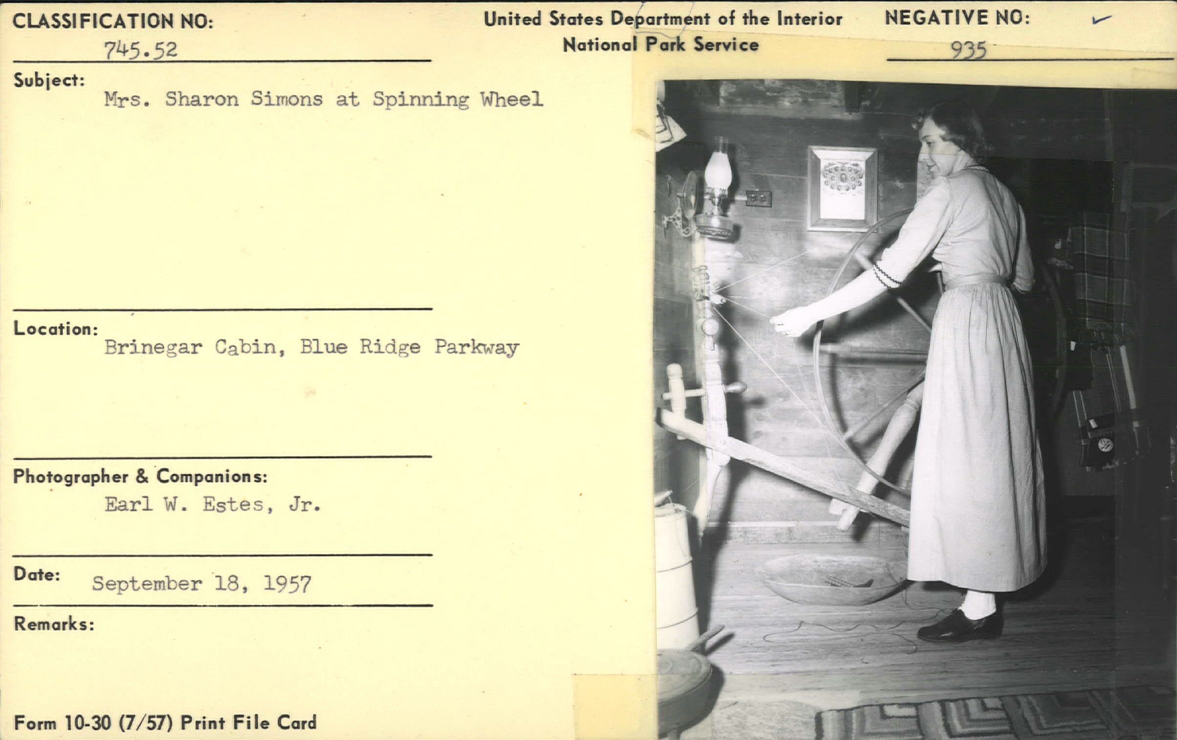 Mrs. Sharon Simons at spinning wheel