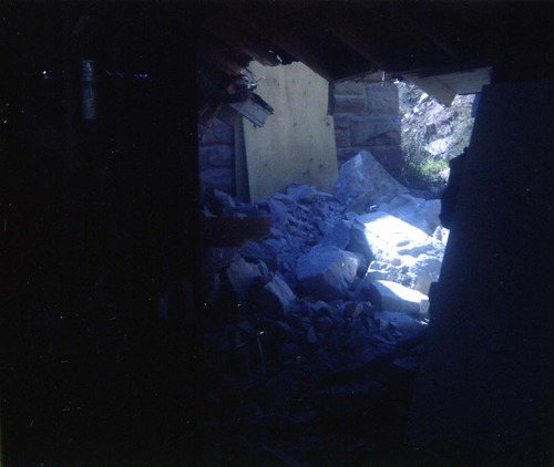 Color photo of rock slide in maintenance yard.