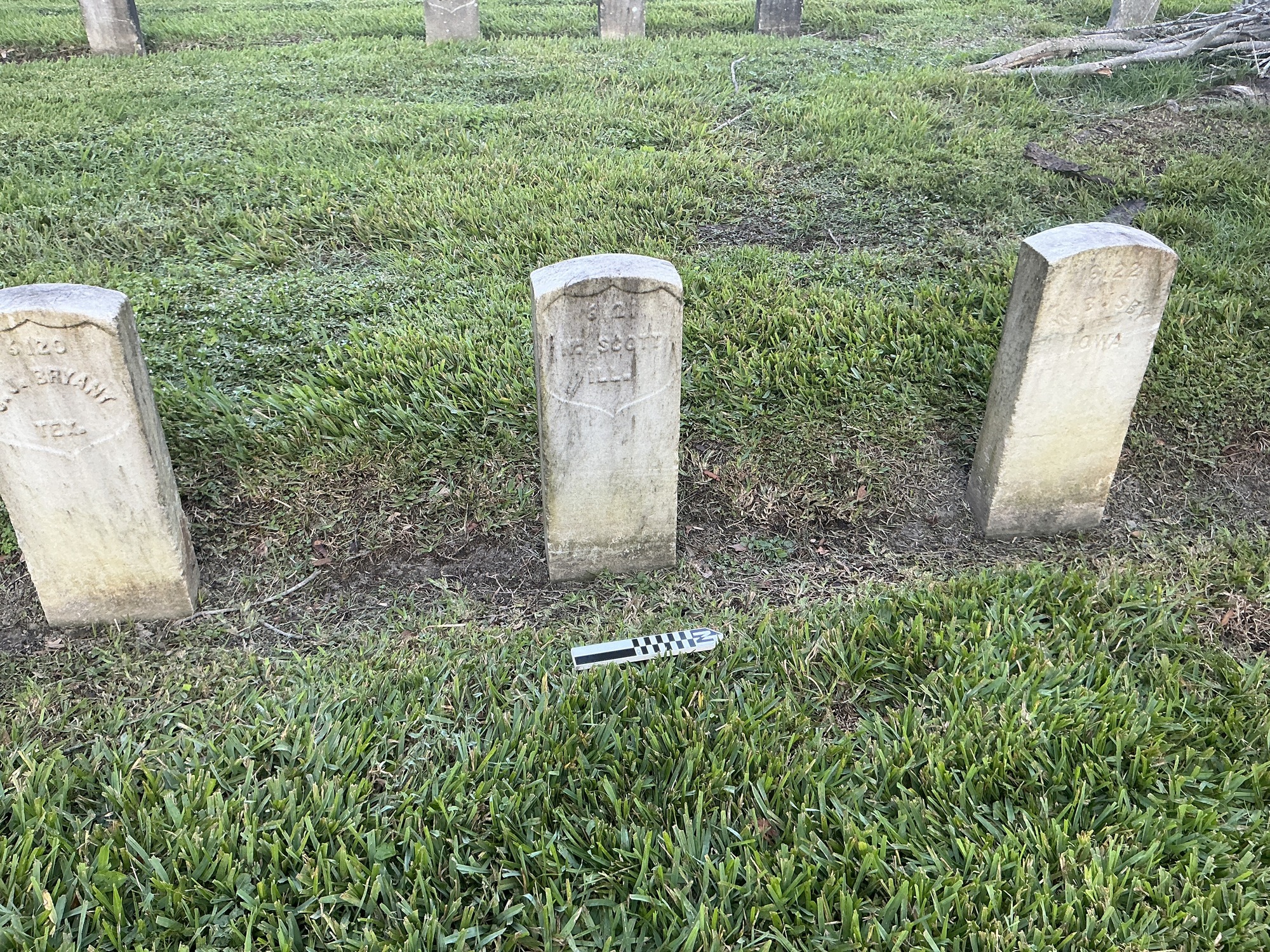 Extra image of historic upright marble headstone with recessed shield face.