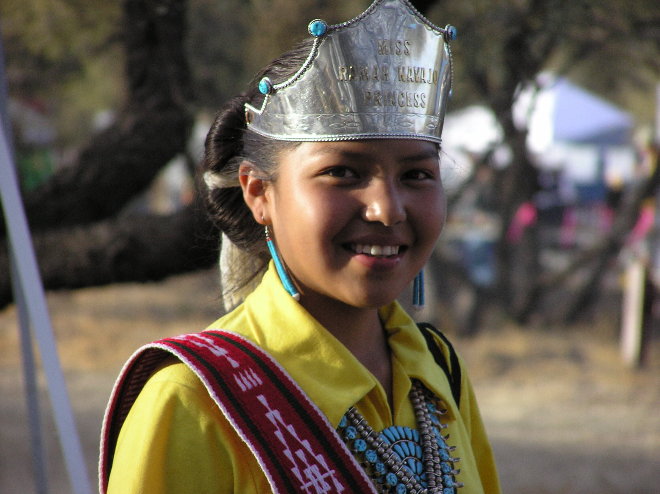 Young woman with crown, Navajo jewelry and garb