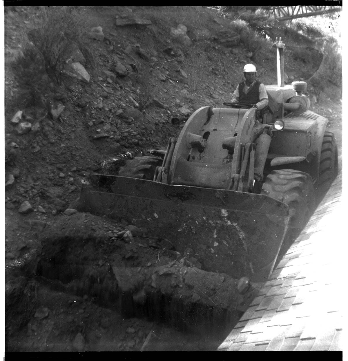 BW photo of rock slide in the maintenance yard.