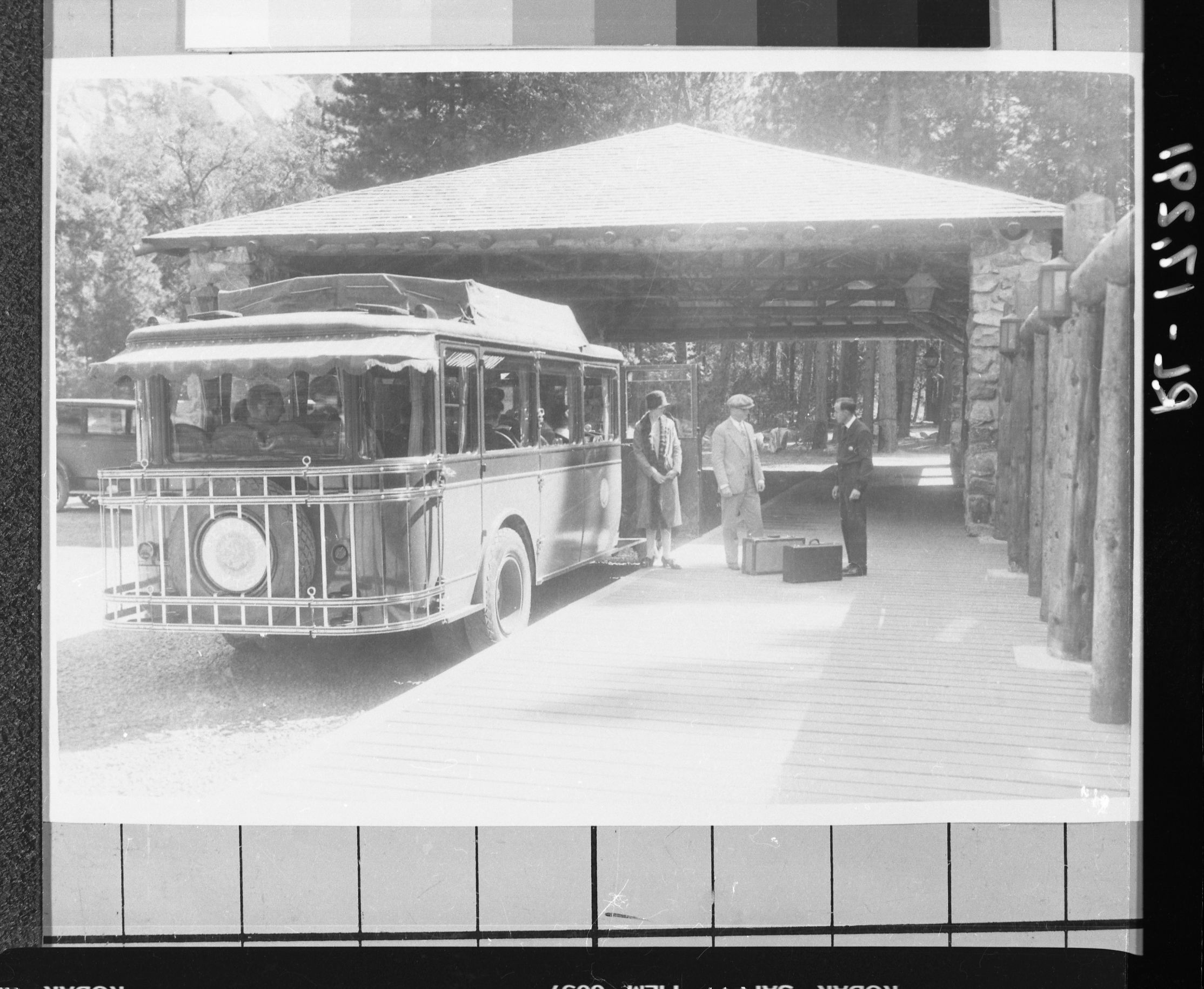 Copy Neg: J. Ernest, 1983. Y. T. S. stage (white bus) at Ahwahnee Hotel (prior to frog pond). Original print in the over-sized photo drawer in RL. [Bus in ACF Brill. See also RL-2304, likely same dated - 10/24/01 Bruce Austin]/
