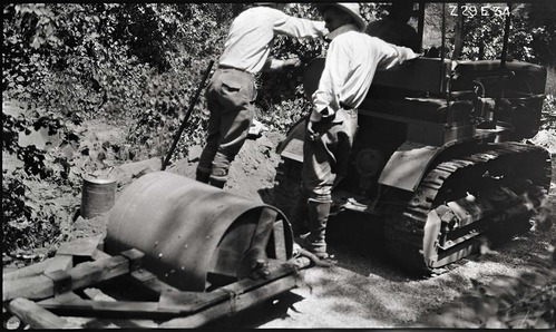 Narrows construction- rolling the base course.