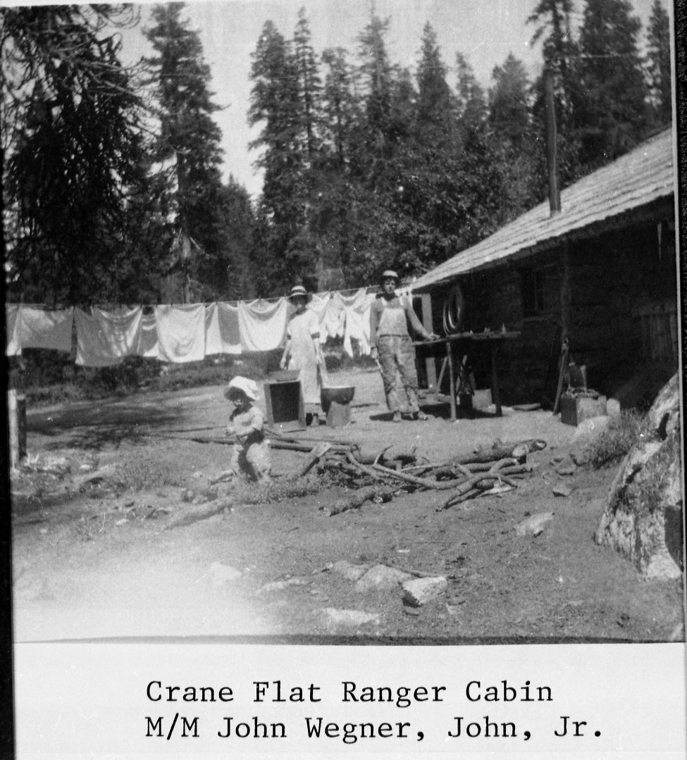 Crane Flat Ranger cabin, Mr. & Mrs. John Wegner & John, Jr. Copied from the Wegner photo album.