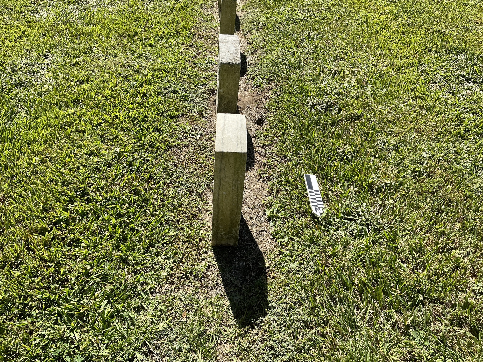 Extra image of historic upright marble headstone with recessed shield face.